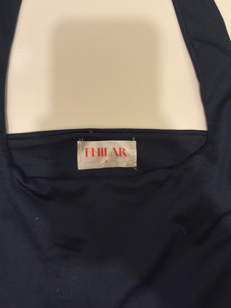 Fhilar Navy Blue Halter in size large (Category: Sleeveless) located in Imus. Submitted by the_preloved_garage (Listing ID 1460282371, Image 3). Description: - size: large - used once - sf shouldered by the buyer - flaws in the middle left, although not sure what caused it NO COD .