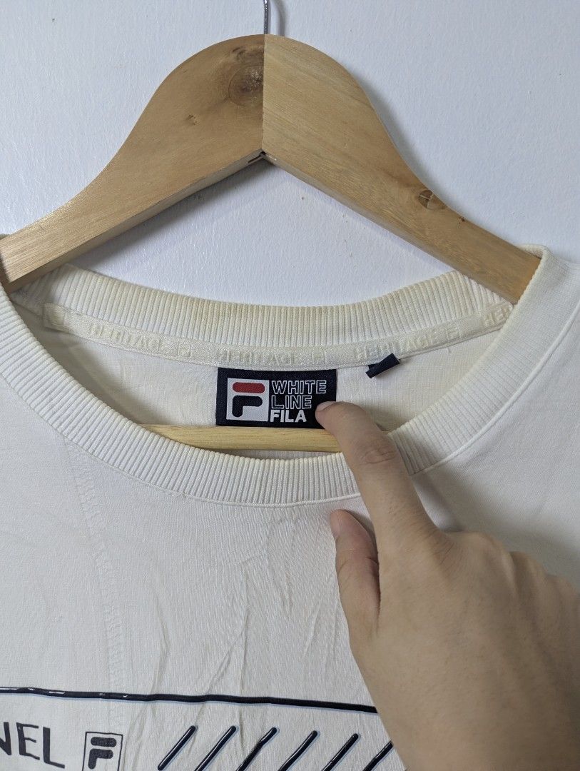 Fila Crewneck Sweatshirt for Men - Large (Category: Coats, Jackets and Outerwear) located in Quezon City. Submitted by activefitforless (Listing ID 1460236702, Image 3). Description: All items are preloved / thrifted and may show normal signs of previous use. Any noticeable flaws will be disclosed whenever possible. Please check the actual item photos and measurements before purchasing. AI-generated model images are used for styling and fit refer