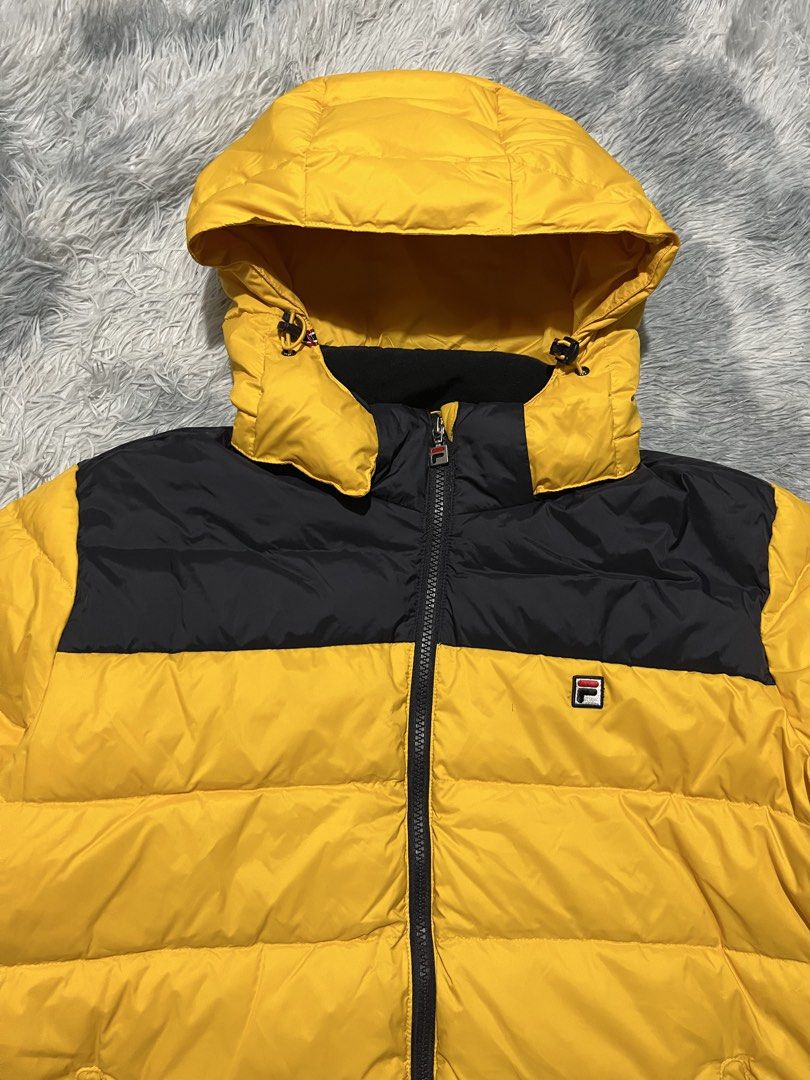 Fila Down Puffer Jacket (Category: Coats, Jackets and Outerwear) located in Sasmuan (Sexmoan). Submitted by winterclothes.ph (Listing ID 1460164190, Image 2). Description: Fila Down Puffer Jacket UK S-M on tag Width 21.5 Length 25 Excellent Condition 1750.