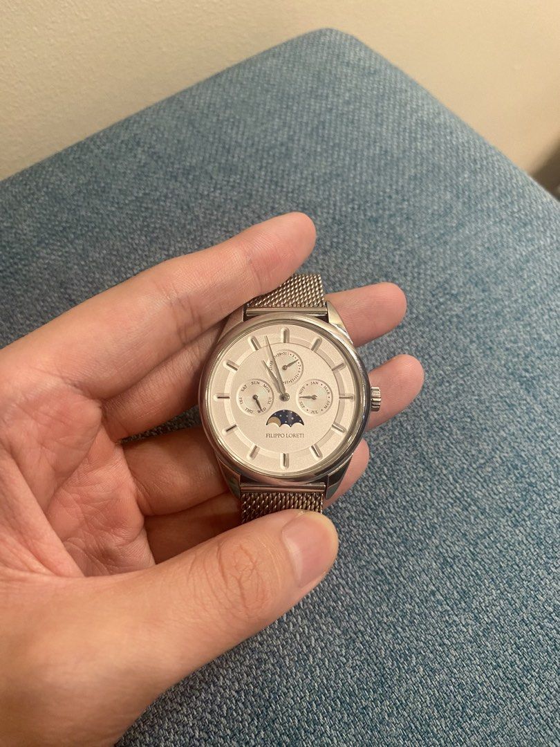 Filippo Loreti Venice Moonphase Silver Mesh Watch (Category: Luxury Watches) located in Makati City. Submitted by blackcatlover01 (Listing ID 1460268319, Image 2). Description: Selling my Filippo Loreti Venice Moonphase watch in excellent condition and with no defects. Elegant and versatile design, suitable for both formal and everyday wear. • Moonphase display • Day & month indicators, date display • Stainless steel Milanese mesh bracelet • Silv