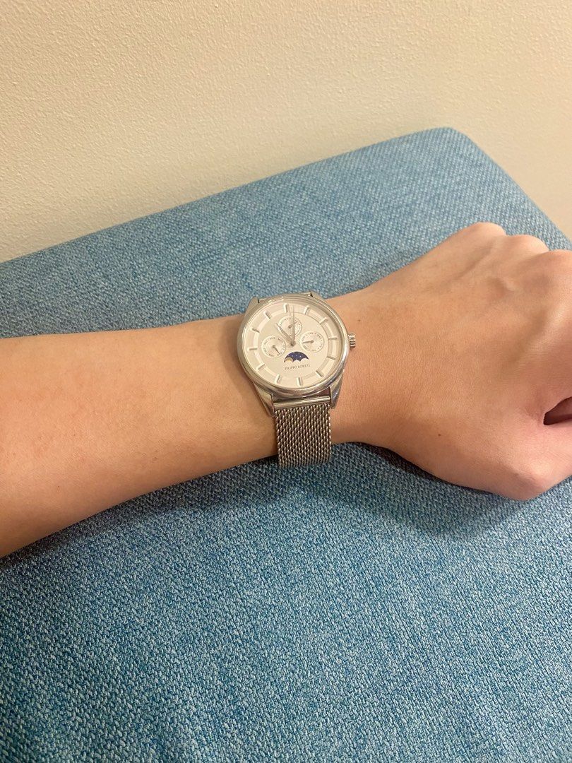 Filippo Loreti Venice Moonphase Silver Mesh Watch (Category: Luxury Watches) located in Makati City. Submitted by blackcatlover01 (Listing ID 1460268319, Image 1). Description: Selling my Filippo Loreti Venice Moonphase watch in excellent condition and with no defects. Elegant and versatile design, suitable for both formal and everyday wear. • Moonphase display • Day & month indicators, date display • Stainless steel Milanese mesh bracelet • Silv