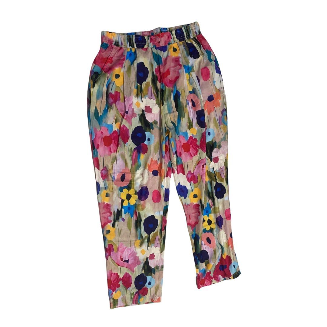 Floral Print Elastic Waist Pants (Category: Other Bottoms) located in Naga. Submitted by clidtw (Listing ID 1460244826, Image 1). Description: - Lightweight fabric - Vibrant floral print (pink, blue, yellow, red flowers) - Comfortable elastic waistband - Ideal for a casual, summery look - Easy to style and wear.
