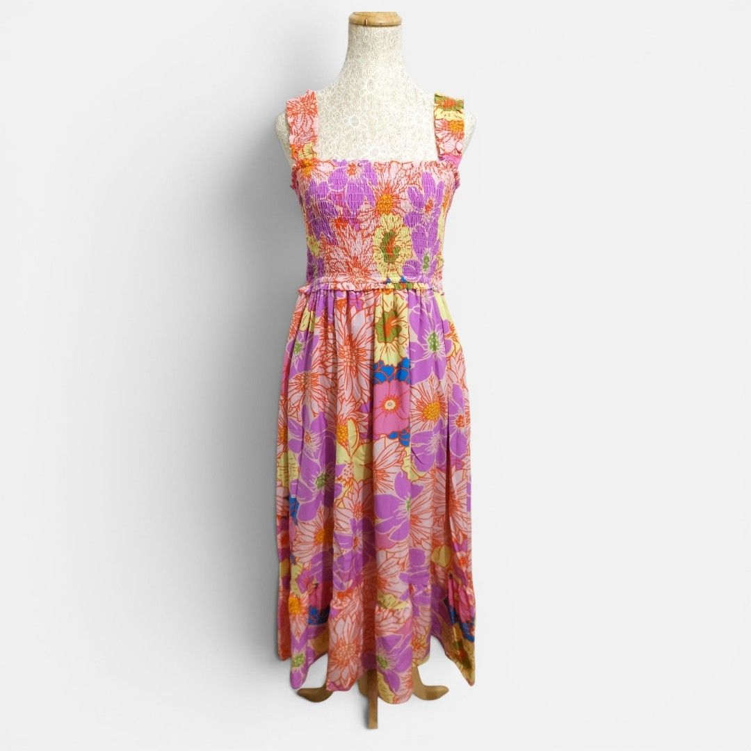 Floral Smocked Maxi Dress (Category: Dresses) located in Mandaue City. Submitted by stylefigjam (Listing ID 1460243143, Image 1). Description: - Fun floral print maxi dress - Smocked bodice with flattering square neckline - Wide, comfortable straps - Pretty ruffled hemline - with side pockets - Lightweight and flowy fabric, ideal for summer or beach vacations.