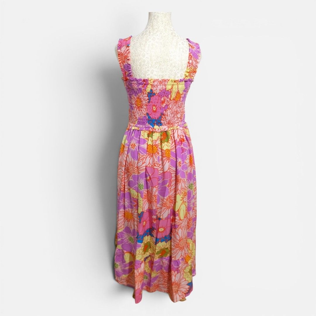 Floral Smocked Maxi Dress (Category: Dresses) located in Mandaue City. Submitted by stylefigjam (Listing ID 1460243143, Image 2). Description: - Fun floral print maxi dress - Smocked bodice with flattering square neckline - Wide, comfortable straps - Pretty ruffled hemline - with side pockets - Lightweight and flowy fabric, ideal for summer or beach vacations.