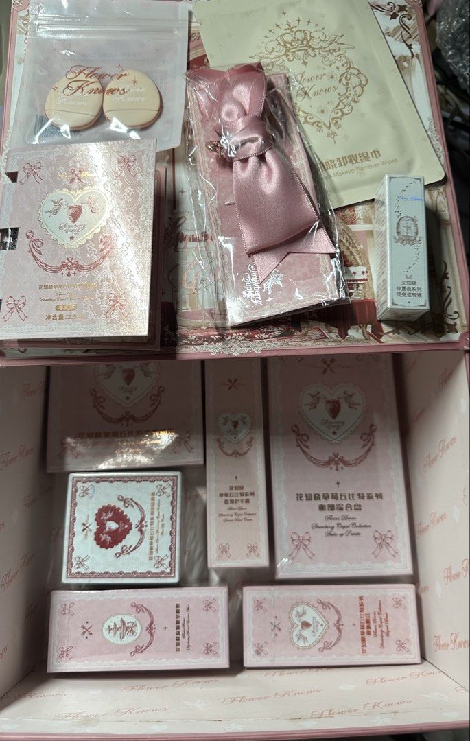 Flower Knows Strawberry Cupid 12 items makeup set (Category: Makeup) located in Manila. Submitted by honeyglow (Listing ID 1460258915, Image 1). Description: 1 face palette 02 strawberry cassus 1 pressed powder 01 soft lavender 1 blush 01 1 VA03 travel concealer 1 handcream strawberry milkshake 1 facial essence mist 1 lip cream V01 vanitea 1 concealer puff 1 sample perfume 1 flower knows box 1 makeup wipes 1 hair clip.
