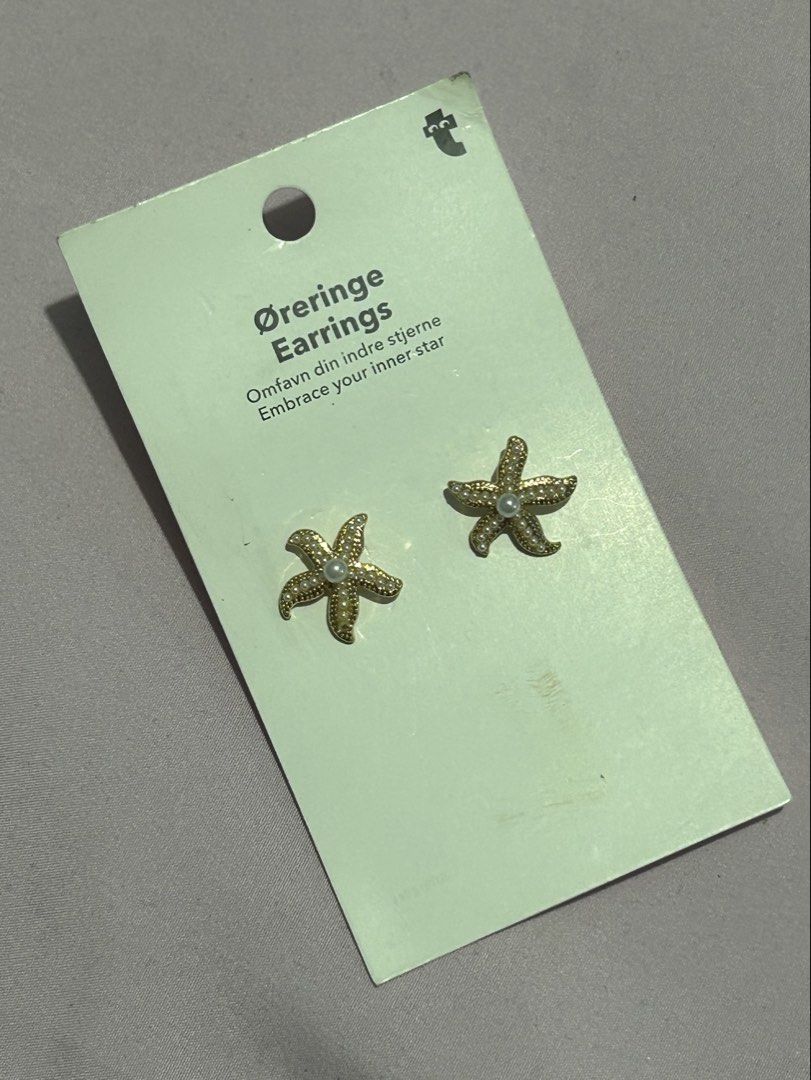 Flying Tiger Star Fish Gold Earrings (Category: Earrings) located in Cavite. Submitted by apricity.aes (Listing ID 1460205547, Image 1). Description: Never been worn Nawala isang lock tho may replacement na lock naman just not the same sa kabila .
