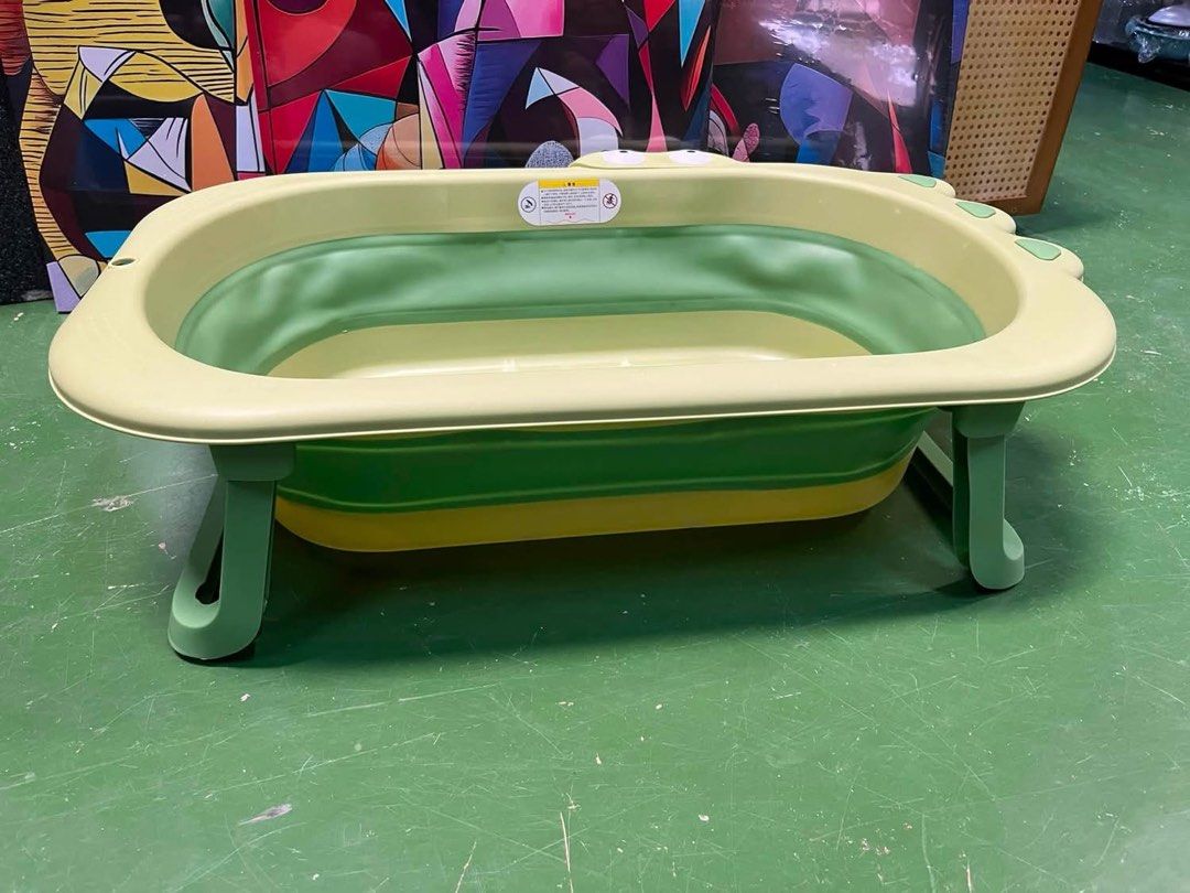 Foldable Baby Bathtub with Cute Crocodile Design (Category: Bathtub & Bath Accessories) located in Antipolo. Submitted by istitikfordago (Listing ID 1460221233, Image 3). Description: - Lightweight and foldable for easy storage and travel - Adorable crocodile design with fun eyes and toes - Built-in drain plug for quick and easy emptying - Perfect for bath time at home or on the go - Made from safe and durable materials.