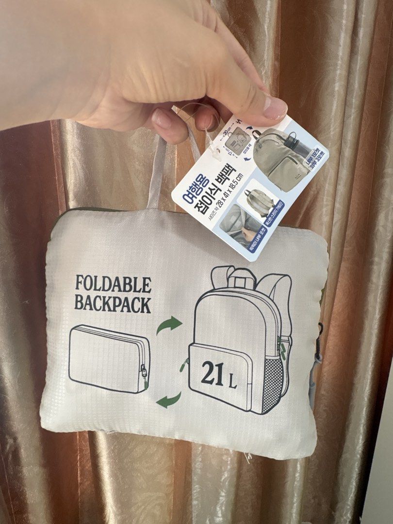 Foldable backpack (Category: Backpacks) located in Singapore. Submitted by eluphoria.sparks (Listing ID 1460156414, Image 1). Description: Bought it from Korea this March and have not touch it since. Easy to bring out, esp oversea. .