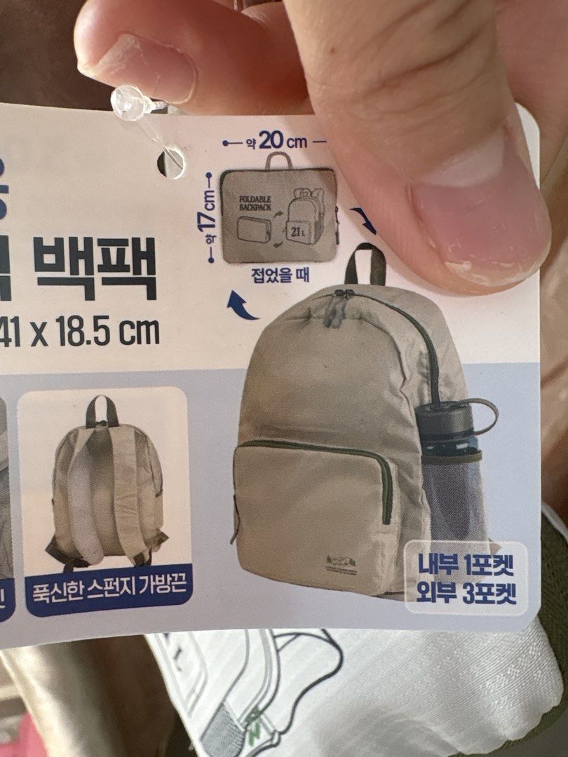 Foldable backpack (Category: Backpacks) located in Singapore. Submitted by eluphoria.sparks (Listing ID 1460156414, Image 3). Description: Bought it from Korea this March and have not touch it since. Easy to bring out, esp oversea. .