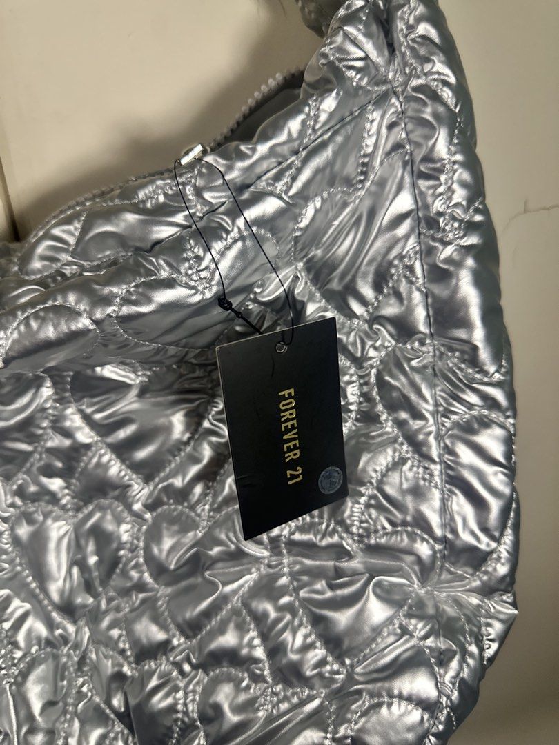 Forever 21 Silver Quilted Puffer Bag (Category: Shoulder Bags) located in Quezon City. Submitted by bentabelles (Listing ID 1460259200, Image 2). Description: brand new, us bought.