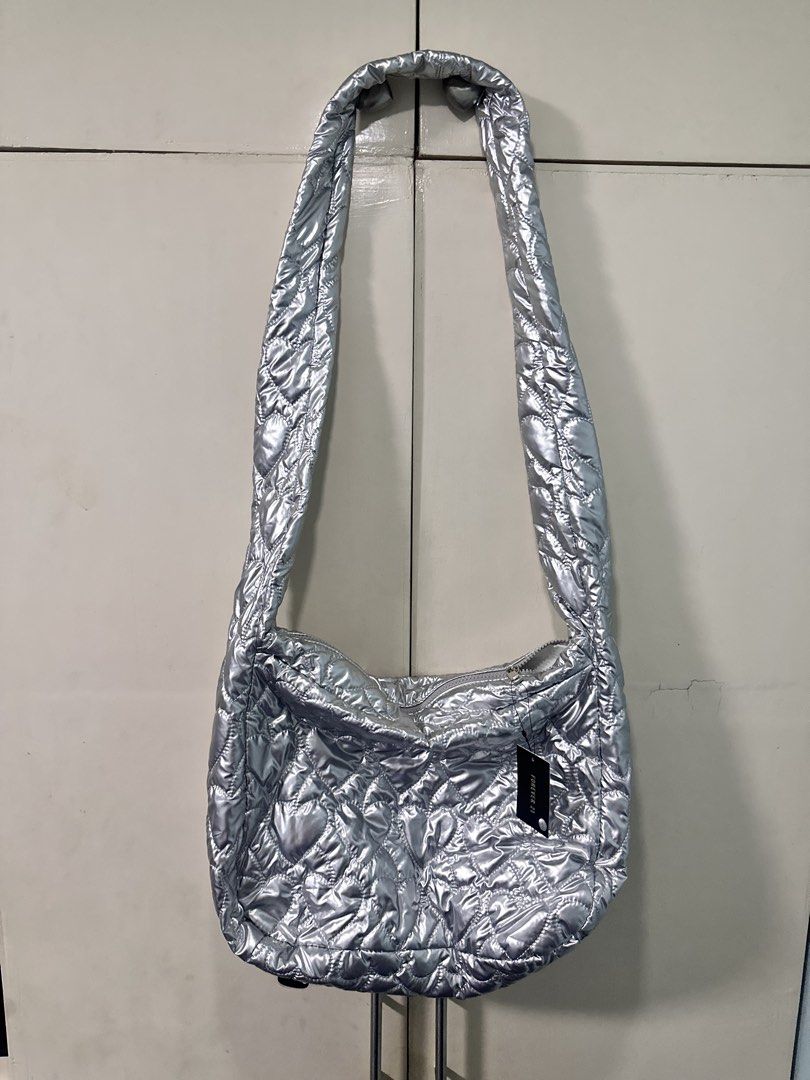 Forever 21 Silver Quilted Puffer Bag (Category: Shoulder Bags) located in Quezon City. Submitted by bentabelles (Listing ID 1460259200, Image 1). Description: brand new, us bought.