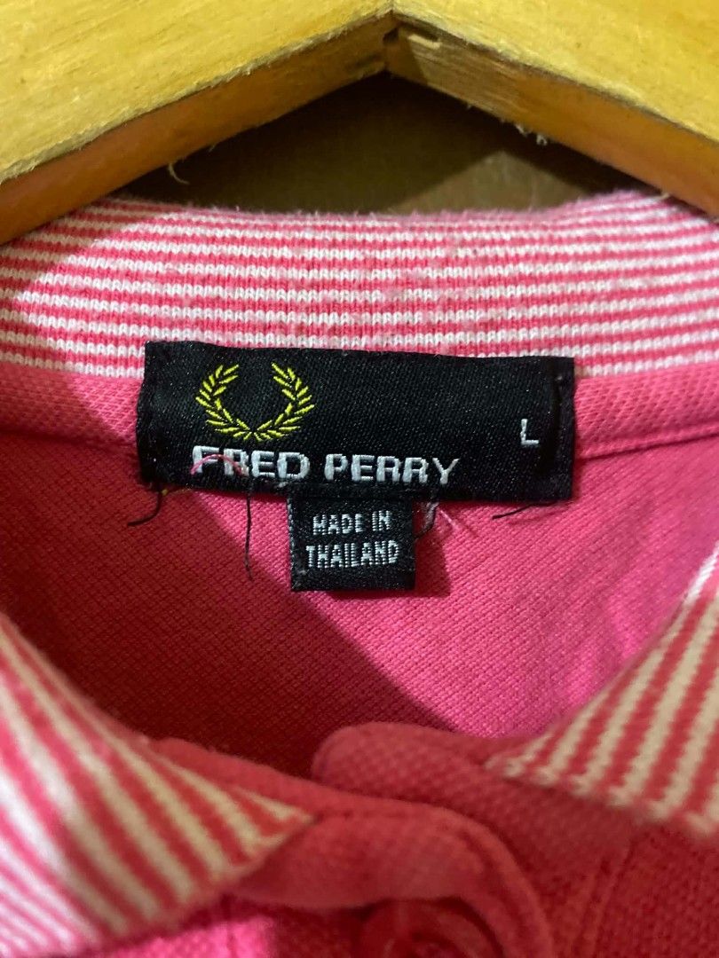 Fred Perry Pink Polo Shirt Size L (Category: Tshirts & Polo Shirts ) located in Taguig. Submitted by cabugchear34421 (Listing ID 1460270570, Image 3). Description: - Women's Fred Perry polo shirt - Iconic embroidered laurel wreath logo on chest - Striped collar and cuffs for added detail - No issue.