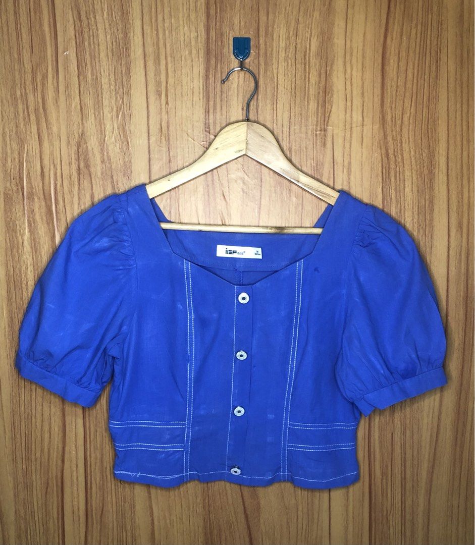 Front-Button Crop Top Color: Cornflower Blue Fitting: S-M (Category: Shirts) located in Baguio. Submitted by shrlnjy (Listing ID 1460299343, Image 2). Description: Fashion Tops/Blouses from Bale Front-Button Crop Top Color: Cornflower Blue Fitting: S-M (Lighter in Actual) P300 Mannequin Reference: Bust: 30" Shoulder 12.5" Waist 24" Note: Color may differ from the actual due to phone's lighting settings..