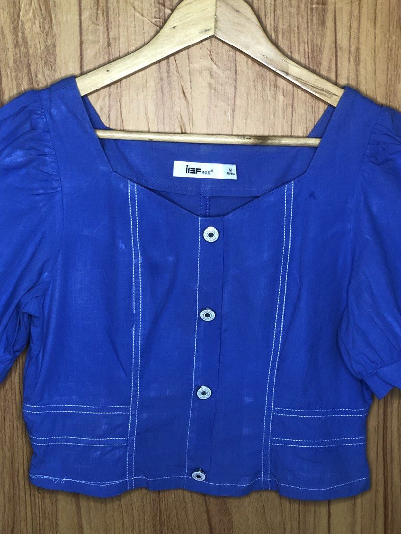 Front-Button Crop Top Color: Cornflower Blue Fitting: S-M (Category: Shirts) located in Baguio. Submitted by shrlnjy (Listing ID 1460299343, Image 3). Description: Fashion Tops/Blouses from Bale Front-Button Crop Top Color: Cornflower Blue Fitting: S-M (Lighter in Actual) P300 Mannequin Reference: Bust: 30" Shoulder 12.5" Waist 24" Note: Color may differ from the actual due to phone's lighting settings..