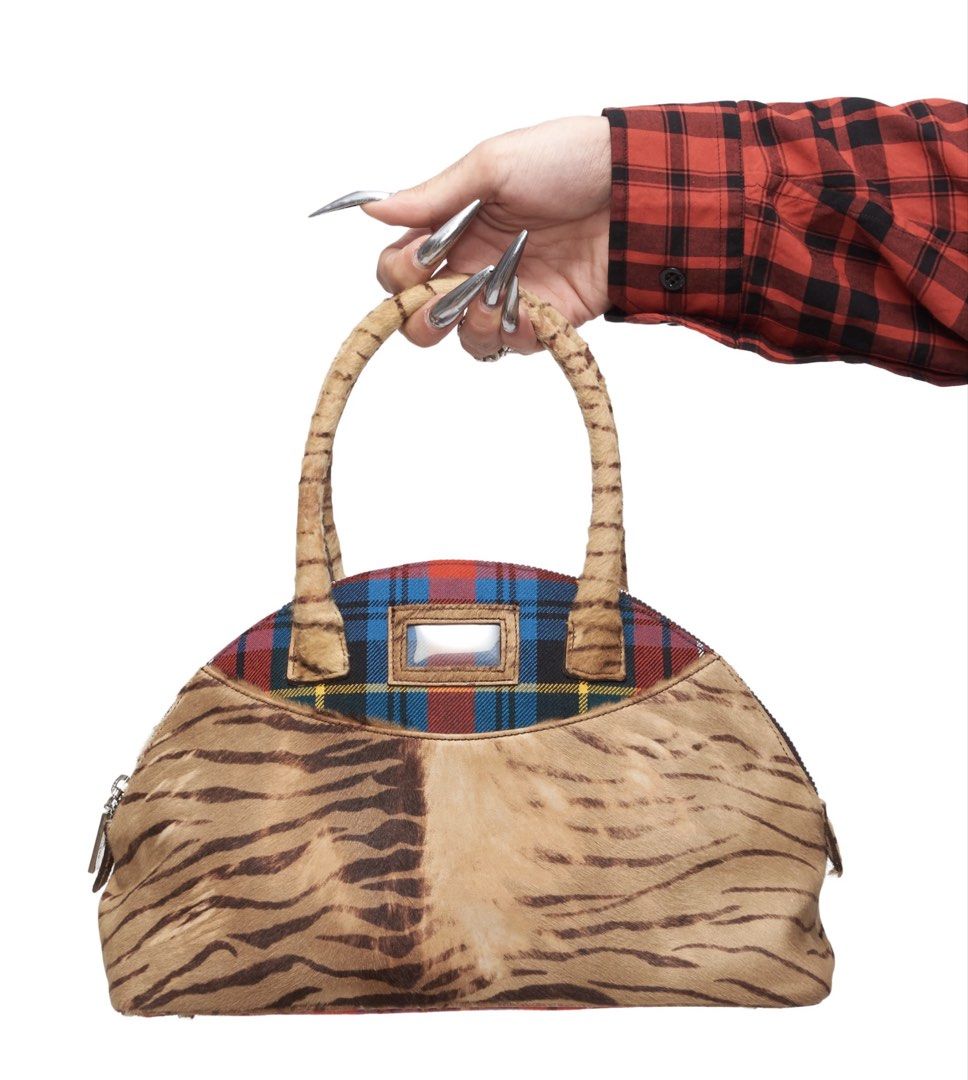 Galliano (Category: Luxury Bags & Wallets) located in Mandaluyong City. Submitted by envoguevintage88 (Listing ID 1460153323, Image 3). Description: The quintessential John Galliano bag in a sumptuous zebra pony . The only designer ever to be a scheduled for a full collection show at the MET for 2027. Controversial withdrawal does not eradicate his legendary talent and skill. .