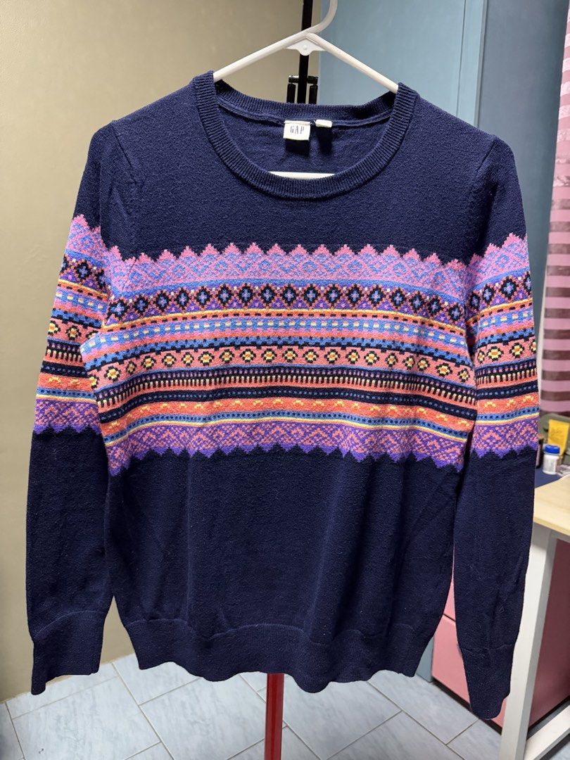 GAP Knit Sweater Size M (Category: Coats, Jackets and Outerwear) located in San Jose del Monte. Submitted by thriftream (Listing ID 1460260179, Image 1). Description: - Features a colorful Fair Isle pattern on chest and sleeves - Crew neck, long sleeves - Measurements: Length approx. 25 inches, Chest approx. 19 inches - Ideal for cooler weather.