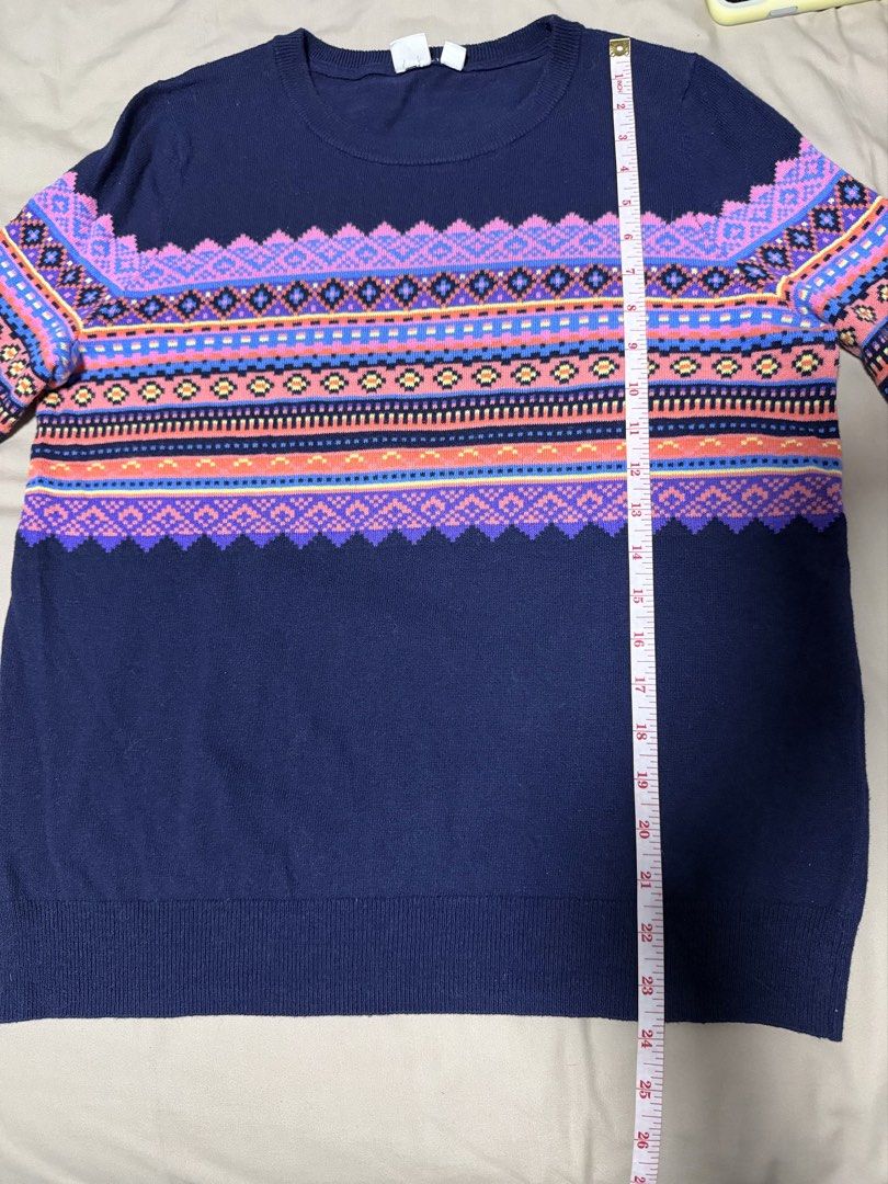 GAP Knit Sweater Size M (Category: Coats, Jackets and Outerwear) located in San Jose del Monte. Submitted by thriftream (Listing ID 1460260179, Image 3). Description: - Features a colorful Fair Isle pattern on chest and sleeves - Crew neck, long sleeves - Measurements: Length approx. 25 inches, Chest approx. 19 inches - Ideal for cooler weather.