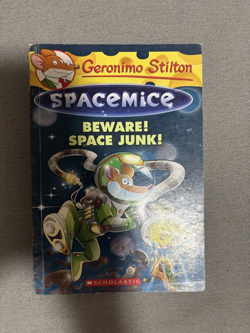 Geronimo Stilton Spacemice: Beware! Space Junk! (Category: Children's Books) located in Marikina City. Submitted by xtine.espinosa (Listing ID 1460240749, Image 1). Description: - Title: Geronimo Stilton Spacemice: Beware! Space Junk! - Genre: Space Adventure - Ideal for: Young readers who love space and adventure stories - Publisher: Scholastic - Features: Fun space adventure with Geronimo Stilton.