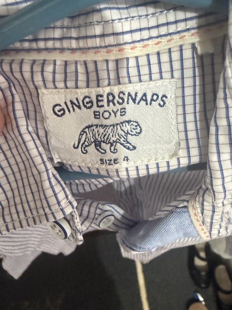Gingersnaps Boys Shirt Size 4 (Category: Babies & Kids Fashion) located in Bacoor. Submitted by annemargarett (Listing ID 1460155650, Image 2). Description: - Brand: Gingersnaps - Style: Boys shirt - Pattern: Blue and white checkered - Sleeves: Long sleeves with button cuffs - Features: Chest pocket on the left - Occasion: Great for casual wear or dressing up.