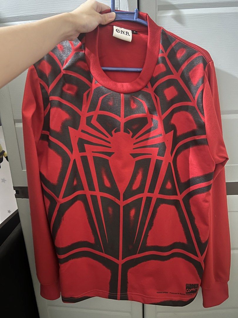 GNR Spider-Man Long Sleeve Shirt (Category: Tshirts & Polo Shirts ) located in Caloocan City. Submitted by marseline28 (Listing ID 1460283738, Image 1). Description: Never used. Rfs - need funds. Quality print and tela. Pm for inquiries/ questions - Brand: GNR - Color: Red - Design: Black spider web graphic on front, large spider logo on back - Style: Long sleeve shirt - Ideal for: Spider-Man fans, casual wear - Features: Comfortable and stylish.