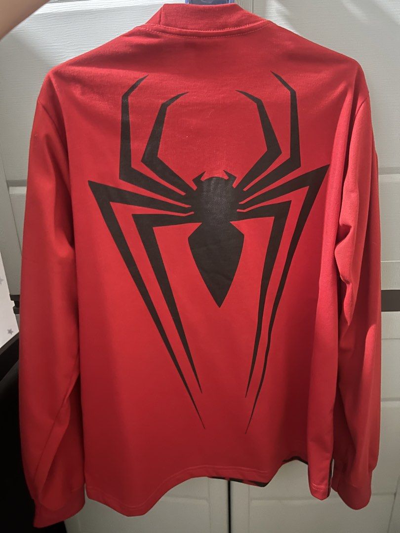GNR Spider-Man Long Sleeve Shirt (Category: Tshirts & Polo Shirts ) located in Caloocan City. Submitted by marseline28 (Listing ID 1460283738, Image 2). Description: Never used. Rfs - need funds. Quality print and tela. Pm for inquiries/ questions - Brand: GNR - Color: Red - Design: Black spider web graphic on front, large spider logo on back - Style: Long sleeve shirt - Ideal for: Spider-Man fans, casual wear - Features: Comfortable and stylish.