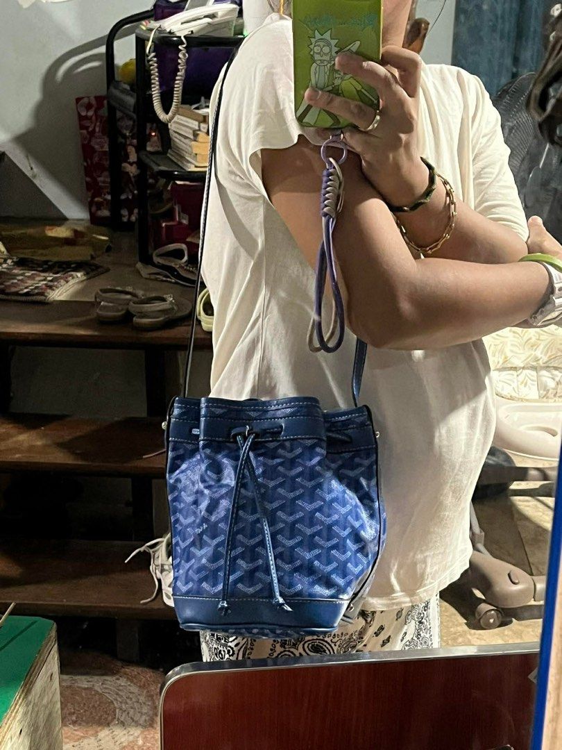 Goyard Blue Monogram Bucket Bag (Category: Luxury Bags & Wallets) located in Mandaue City. Submitted by chuchi152615 (Listing ID 1460287314, Image 2). Description: - Goyard bucket bag - Iconic Goyardine canvas with classic monogram - Durable leather trim and secure drawstring closure - Adjustable shoulder strap for comfortable carrying - Interior shows some signs of use, adding to its character - Spacious design, ideal for carrying all your daily