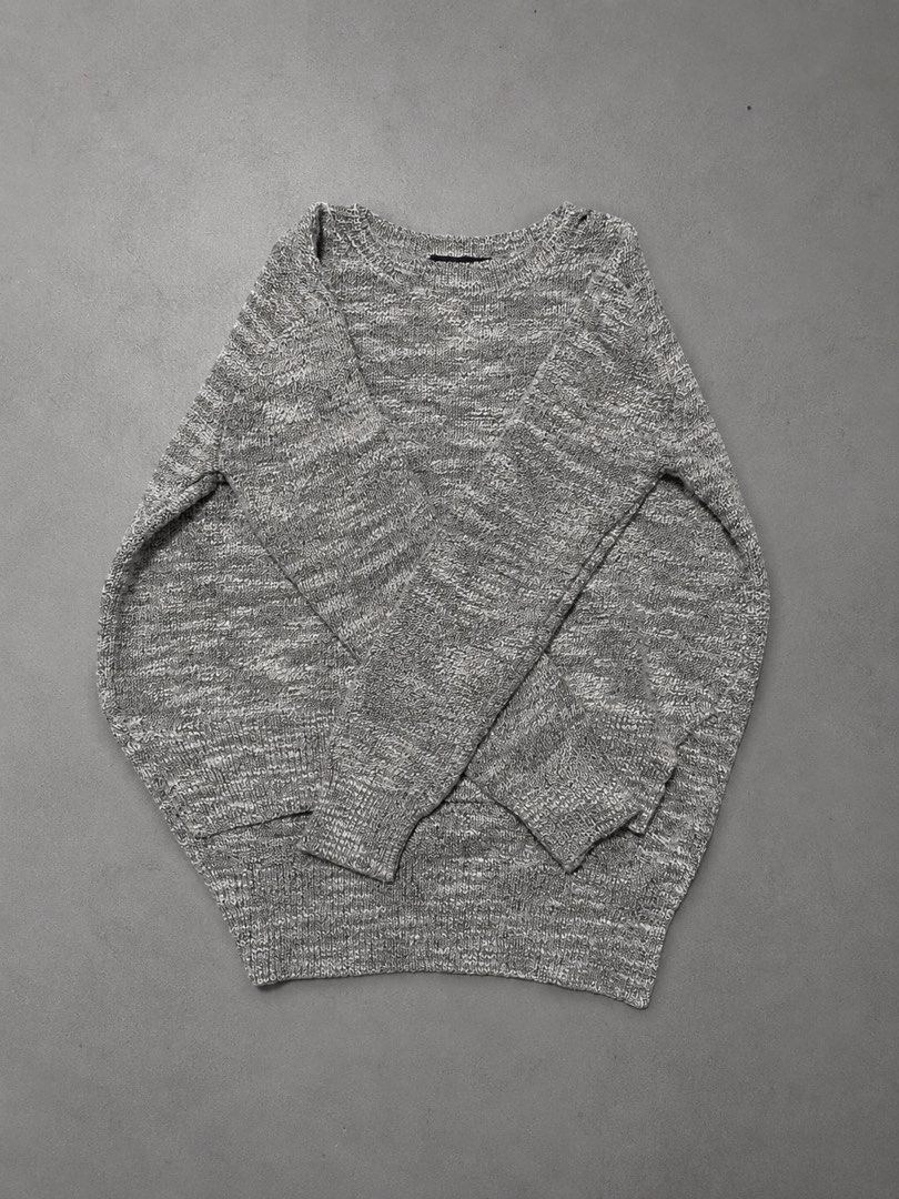 Grey Marled Knit Sweater (Category: Longsleeves) located in Quezon City. Submitted by a1xelmaire (Listing ID 1460292175, Image 1). Description: - Comfy grey marled knit sweater - Long sleeves with ribbed cuffs and hem - Classic crew neck - Versatile for layering or wearing on its own - Easily pairs with jeans or trousers.