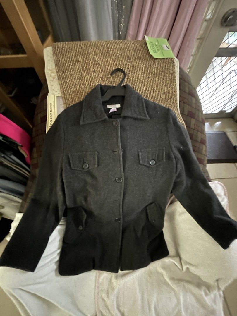 Grey Wool Blend Jacket with Belt (Category: Coats, Jackets and Outerwear) located in Mandaluyong City. Submitted by coolmeybab (Listing ID 1460289796, Image 1). Description: - Grey jacket with a premium wool-blend feel. - Classic collar and button-up front closure. - Two functional chest pockets with button closures. - Two convenient hip pockets. - Includes a matching belt for versatile styling (tie or buckle). - Ideal for layering and staying st