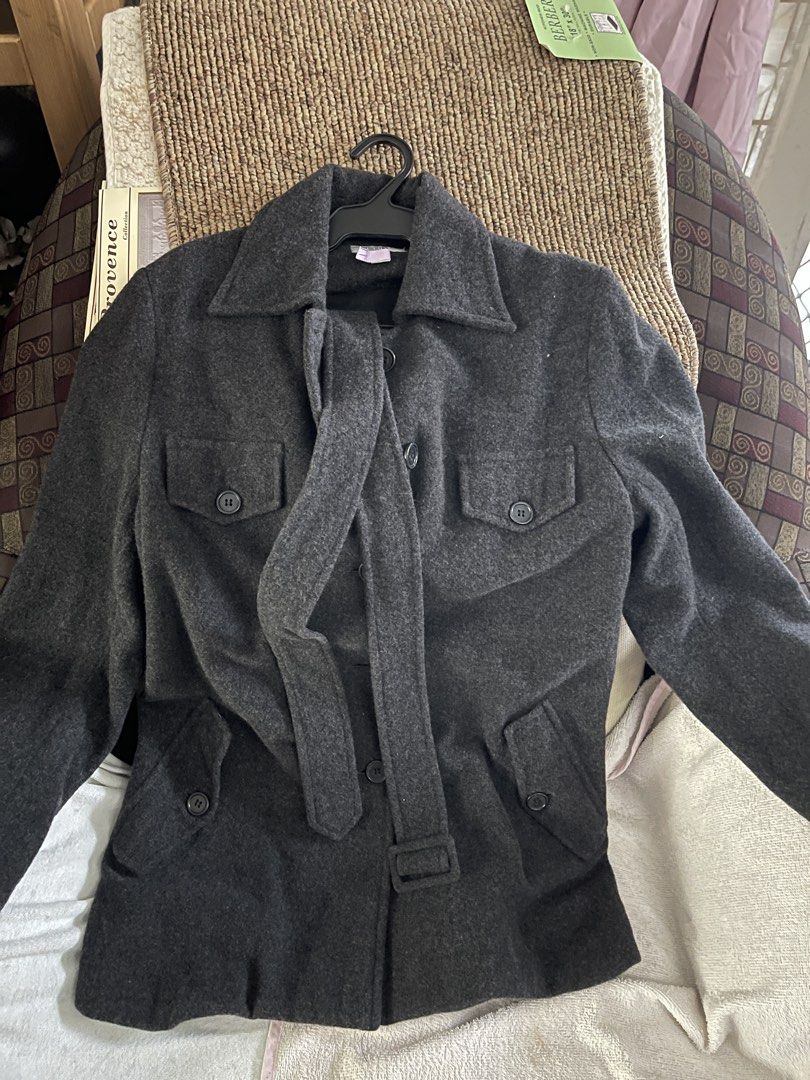 Grey Wool Blend Jacket with Belt (Category: Coats, Jackets and Outerwear) located in Mandaluyong City. Submitted by coolmeybab (Listing ID 1460289796, Image 2). Description: - Grey jacket with a premium wool-blend feel. - Classic collar and button-up front closure. - Two functional chest pockets with button closures. - Two convenient hip pockets. - Includes a matching belt for versatile styling (tie or buckle). - Ideal for layering and staying st