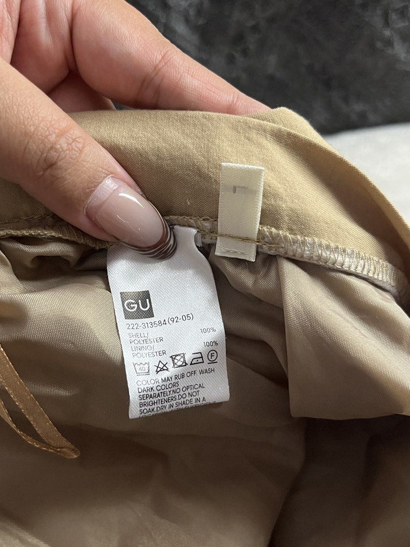 GU Button Front Midi Skirt Khaki (Category: Skirts) located in Manila. Submitted by mazerunnr (Listing ID 1460239853, Image 3). Description: - GU Khaki Midi Skirt - Button front detail all the way down - Elasticated waistband for comfort - Made from polyester - Versatile for casual or dressed-up looks - Easy to style with various tops.
