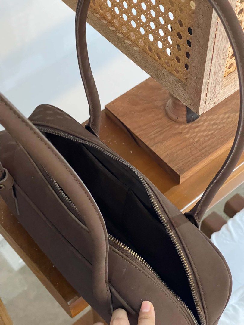 GU Wide Boston Bag in Suede (Category: Shoulder Bags) located in Quezon City. Submitted by _prelovedbykimcruz (Listing ID 1460121071, Image 2). Description: Hi, selling my pre- loved GU bag for only 750! Message me ❣️.