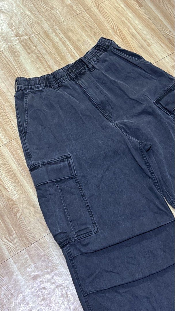 GU Wide Leg Cargo Pants Size M (Category: Other Bottoms) located in Makati City. Submitted by lbrn.jms (Listing ID 1460177826, Image 2). Description: - Washed Black wide leg cargo pants from GU - Elastic waistband with drawstring - Multiple side pockets - Relaxed fit, ideal for casual wear - Made of 100% cotton.