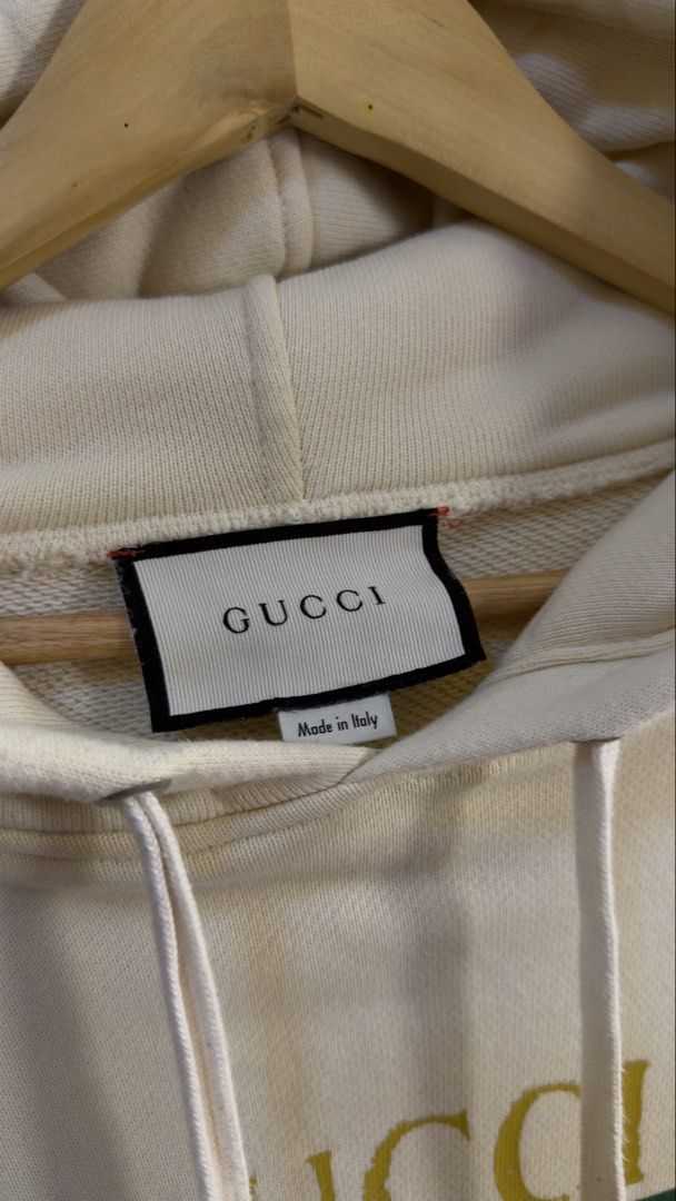 Gucci Cream Logo Hoodie (Category: Hoodies) located in Paranaque City. Submitted by mykapoynton (Listing ID 1460292652, Image 3). Description: Gucci Cream Logo Hoodie - Iconic GG logo on the front - Front pocket and drawstring hood - Made in Italy - Estimated size: Medium (M) - Ideal for any Gucci fan.