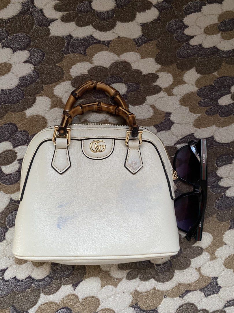 Gucci Diana mini dome tote (Category: Sling Bags) located in Santo Tomas. Submitted by jomeldaniel999 (Listing ID 1460114803, Image 2). Description: Gucci Diana mini dome tote📌 Galing ukay Good condition Issues: scratches, sa handle, stain, sa paint, Price: 📥.