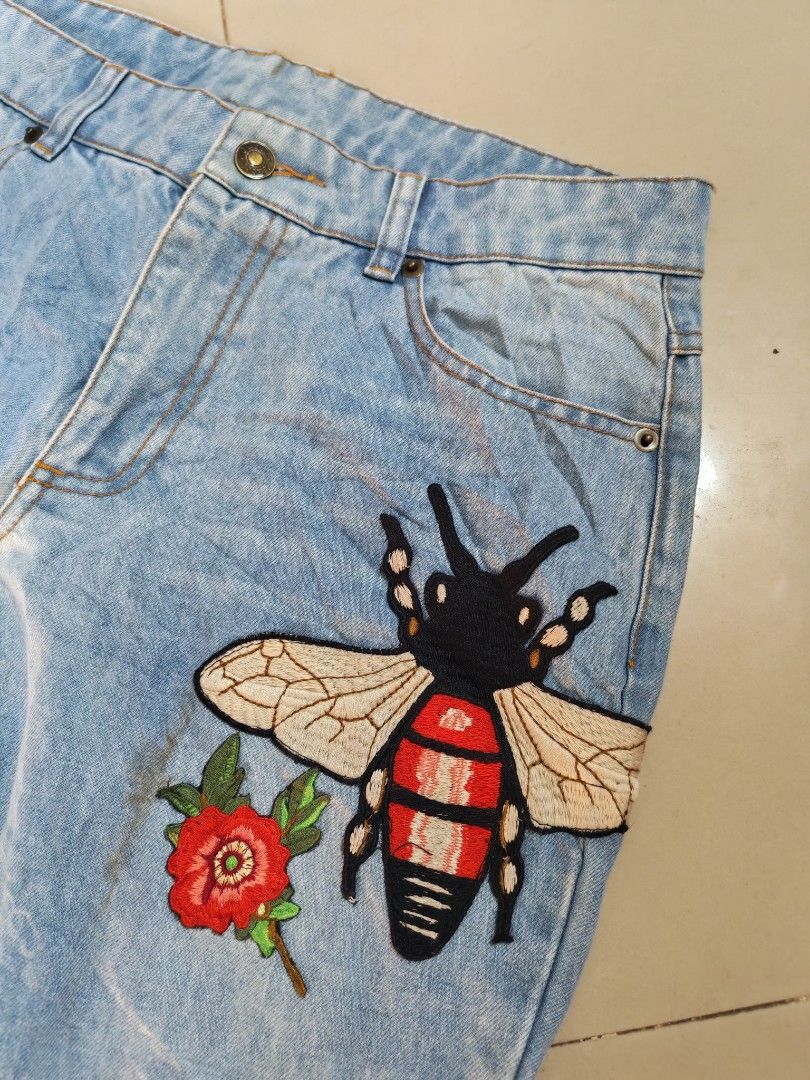 GUCCI PANTS (Category: Jeans) located in Butuan. Submitted by bonz87 (Listing ID 1460150188, Image 2). Description: Gucci Bee and Flower Embroidery Jeans Large ontag dimes 30x37 excellent condition no issue.