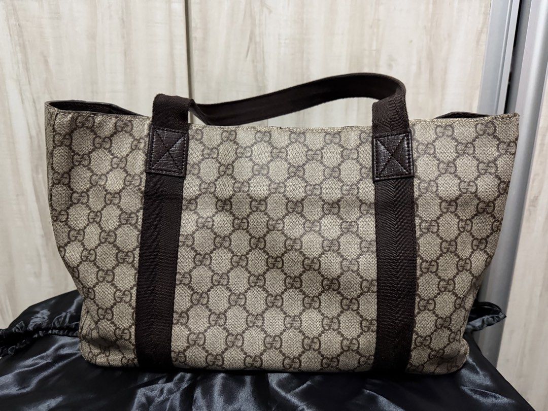 Gucci Tote bag (Category: Tote Bags) located in Cainta. Submitted by doctrish (Listing ID 1460109094, Image 3). Description: Original Gucci tote bag from Japan, comes with generic dust bag. No sticky feels, no bad odors.