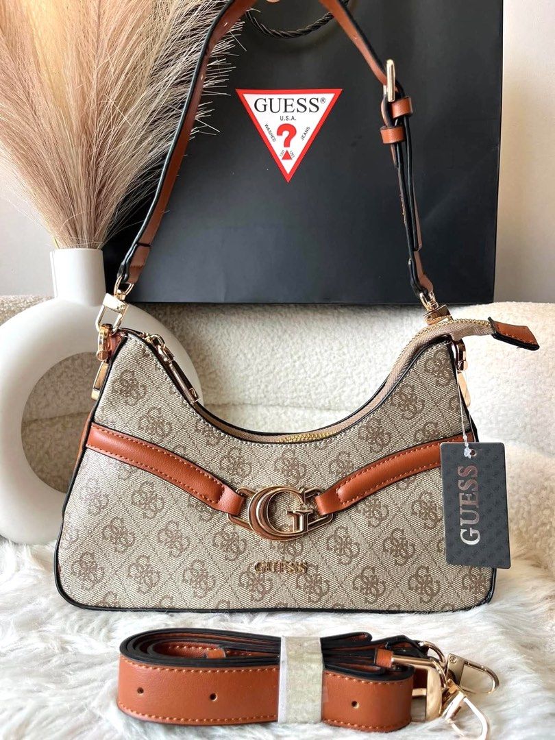 Guess Dea Top Zip Shoulder Bag / Crossbody (Category: Shoulder Bags) located in Bulacan. Submitted by mykakarizza (Listing ID 1460200503, Image 2). Description: NEW✨✨ ₱800 onlyy G Dea Top Zip Shoulder Bag / Crossbody Size: 30.5Lx5.5Wx21H cm Add paperbag 100 📸 Actual pics! 🙋🏻‍♀️ ─── ✦ ─── ✦ ─── ✦ ─── ✦ ─── 🛍️ LOOKING FOR MORE RESELLERS 🛍️ ✨ Buy 3 pcs of ANY items — FREE SHIPPING NA!🚚 ✨ Buy 10 items → FREE SF + ₱50 OFF EACH! 💖 PM us for 30 p