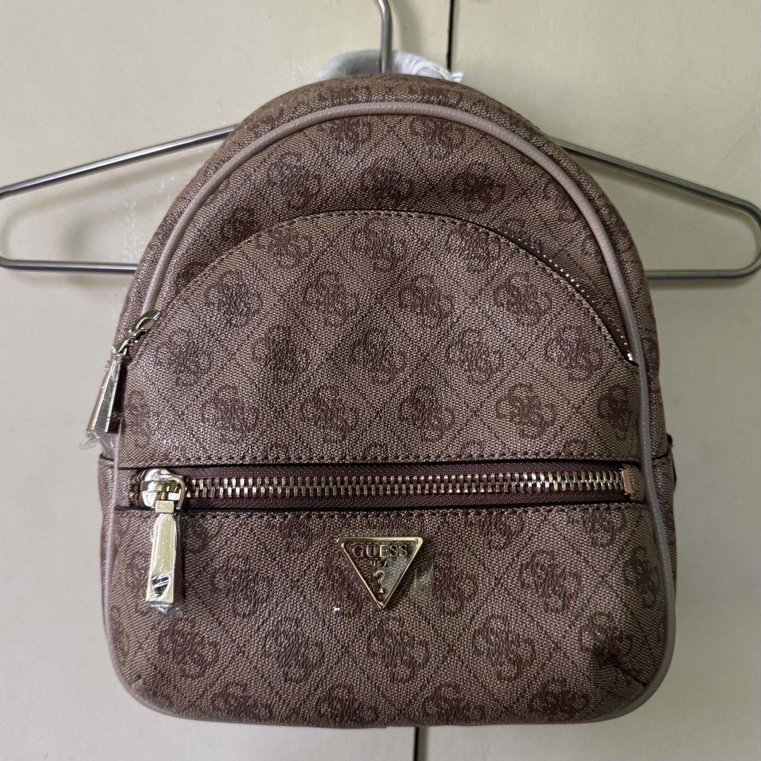 Guess Manhattan II Backpack (Category: Backpacks) located in Makati City. Submitted by jinyoungss (Listing ID 1460226719, Image 1). Description: GUESS Manhattan II Backpack Latte Brand new Zipper and logo with seal With original dustbag.
