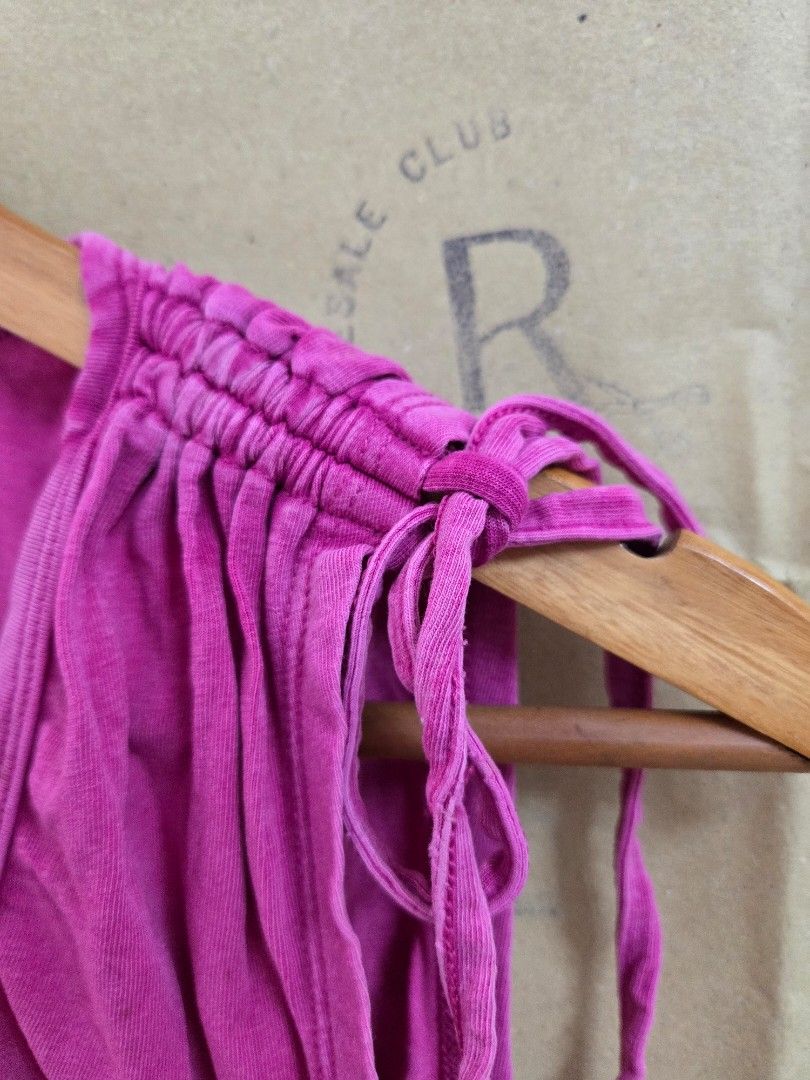 Guess Pink Ruched Tie Strap Top Size M (Category: Sleeveless) located in Tarlac. Submitted by resaleclub (Listing ID 1460150429, Image 2). Description: - Pink Guess top - Size: Medium (M) - Features: Ruched detailing, tie straps - Measurements: Waist 18", Length 22" - Origin: Made in Bangladesh - Style: Great for casual wear.