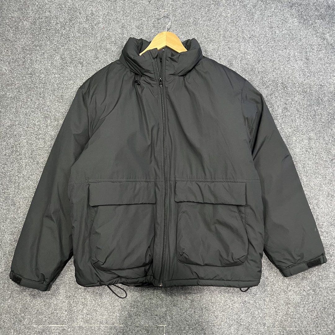 GU/Uniqlo Windproof Stand Collar Puffer (Category: Coats, Jackets and Outerwear) located in Baguio. Submitted by reworn.clo (Listing ID 1460219241, Image 2). Description: GU/Uniqlo Windproof Stand Collar Puffer *packable hood Excellent to as new Width 24-25. Length 28 XL on tag 1880🤝.