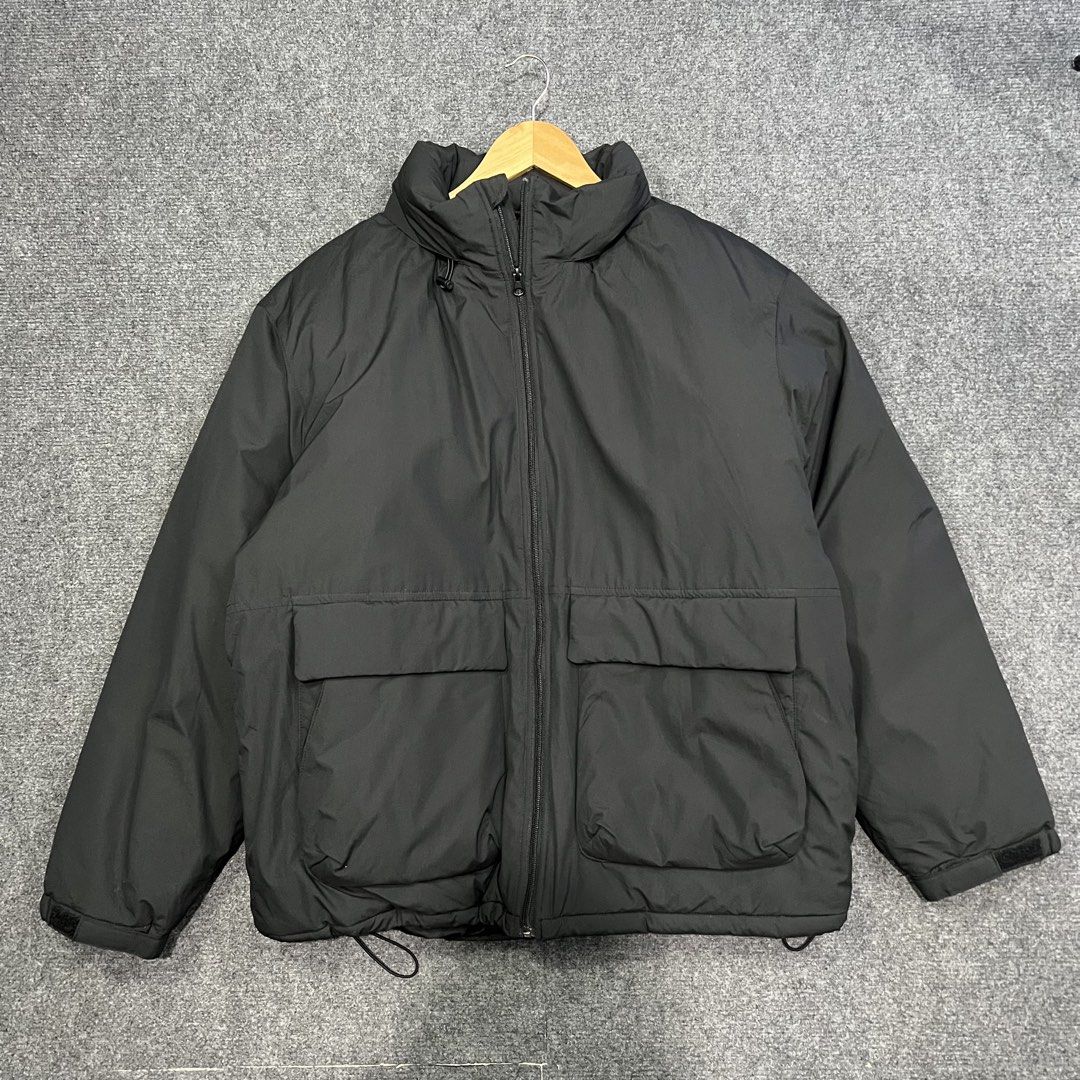GU/Uniqlo Windproof Stand Collar Puffer (Category: Coats, Jackets and Outerwear) located in Baguio. Submitted by reworn.clo (Listing ID 1460219241, Image 1). Description: GU/Uniqlo Windproof Stand Collar Puffer *packable hood Excellent to as new Width 24-25. Length 28 XL on tag 1880🤝.