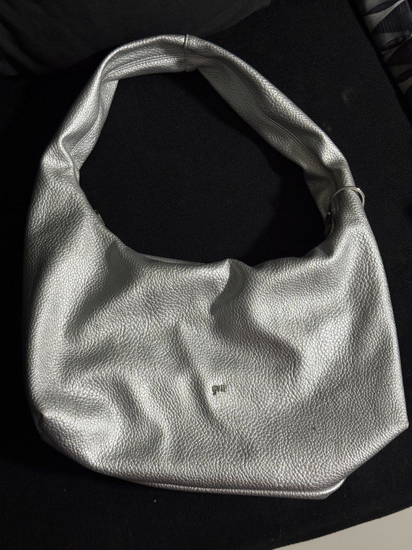 GVN Medium Hobo Bag in Silver (Heavy Pebbled) (Category: Shoulder Bags) located in Makati City. Submitted by _naacy (Listing ID 1460256975, Image 1). Description: FOR SALE GVN MEDIUM HOBO BAG IN SILVER (HEAVY PEBBLED) 🩶🪩 - Bought for 2,200php (slightly nego if sure buyer) - See photos for issues. (Signs of usage & minimal stain only). - Still in good condition since hindi masyado nagagamit. RFS: Not using anymore:(( even if i love it so much, s