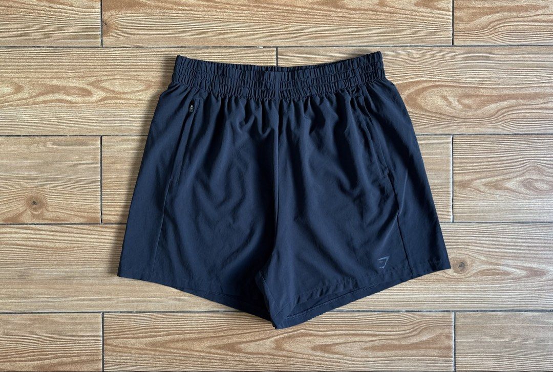 GYMSHARK WOVEN ZIP POCKET SHORTS (Category: Activewear) located in Makati City. Submitted by jnc__apparel (Listing ID 1460113347, Image 3). Description: 🏷️ GYMSHARK WOMENS WOVEN ZIP POCKET SHORTS 📌 Waist: 28-32 📌 Length: 15 📌 Size: Small on tag ~ can fits up to large 📌 Condition: Like new 📌 Color rate: 10/10 📌 Issue: None ✅ Washed and ready to wear.