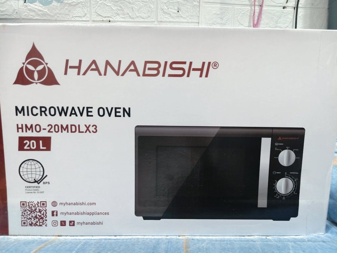 Hanabishi Microwave Oven HMO-20MDLX3 20L (Category: Ovens & Toasters) located in Manila. Submitted by rawna08 (Listing ID 1460194310, Image 1). Description: a week old pa lang. never pa nagamit. RFS: need cash. - Hanabishi Microwave Oven - Model: HMO-20MDLX3 - Capacity: 20 Liters - Features: Timer and Defrost functions - Ideal for: Quick meals and reheating - Condition: Brand new, still in original packaging.