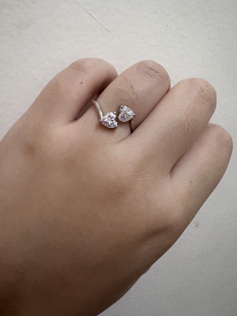 Heart Cut Moissanite Ring with Certificate S925 (Category: Rings) located in Manila. Submitted by alyannaros79007 (Listing ID 1460269383, Image 3). Description: - Beautiful ring with two heart-shaped stones - Moissanite stone, 1.51 carats total weight - Comes with a testing certificate - Silver band - Perfect for gifting or collection .