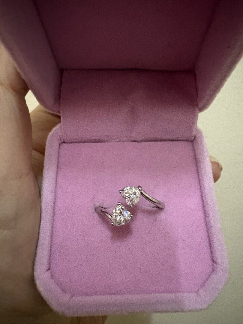 Heart Cut Moissanite Ring with Certificate S925 (Category: Rings) located in Manila. Submitted by alyannaros79007 (Listing ID 1460269383, Image 1). Description: - Beautiful ring with two heart-shaped stones - Moissanite stone, 1.51 carats total weight - Comes with a testing certificate - Silver band - Perfect for gifting or collection .
