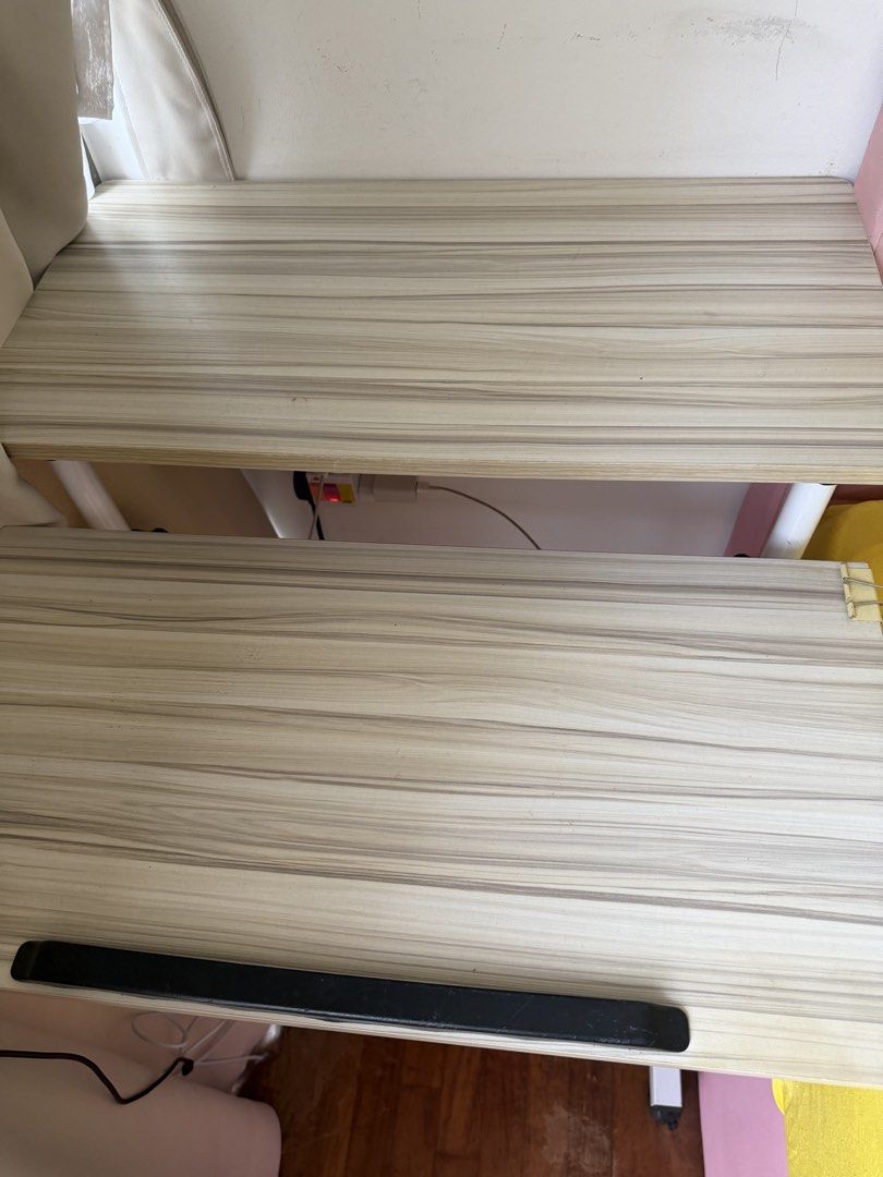 Height Adjustable Table (Category: Tables & Sets) located in Singapore. Submitted by anishka_14 (Listing ID 1460144919, Image 2). Description: Height-Adjustable Study/Work Table Selling a compact height-adjustable table/desk in good condition. Great for studying, working from home, or as a versatile desk for a bedroom. Features: * ✅ Adjustable height — can be set to your preferred level * ✅ Large, spacious tabletop * ✅ Sturdy white metal frame * 