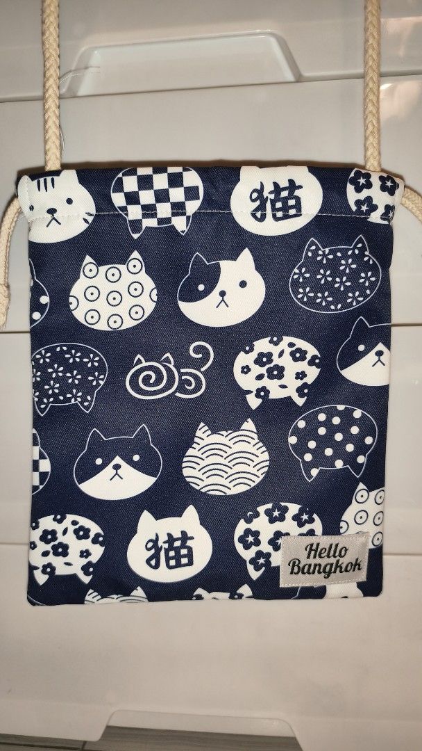 Hello Bangkok Cat Print Drawstring Pouch Bag (Category: Purses & Pouches) located in Manila. Submitted by jucelle (Listing ID 1460246547, Image 1). Description: Hello Bangkok Drawstring Bag 8x9.5 inches Strap: 25inches Brand New Bought in Thailand P200 only!.