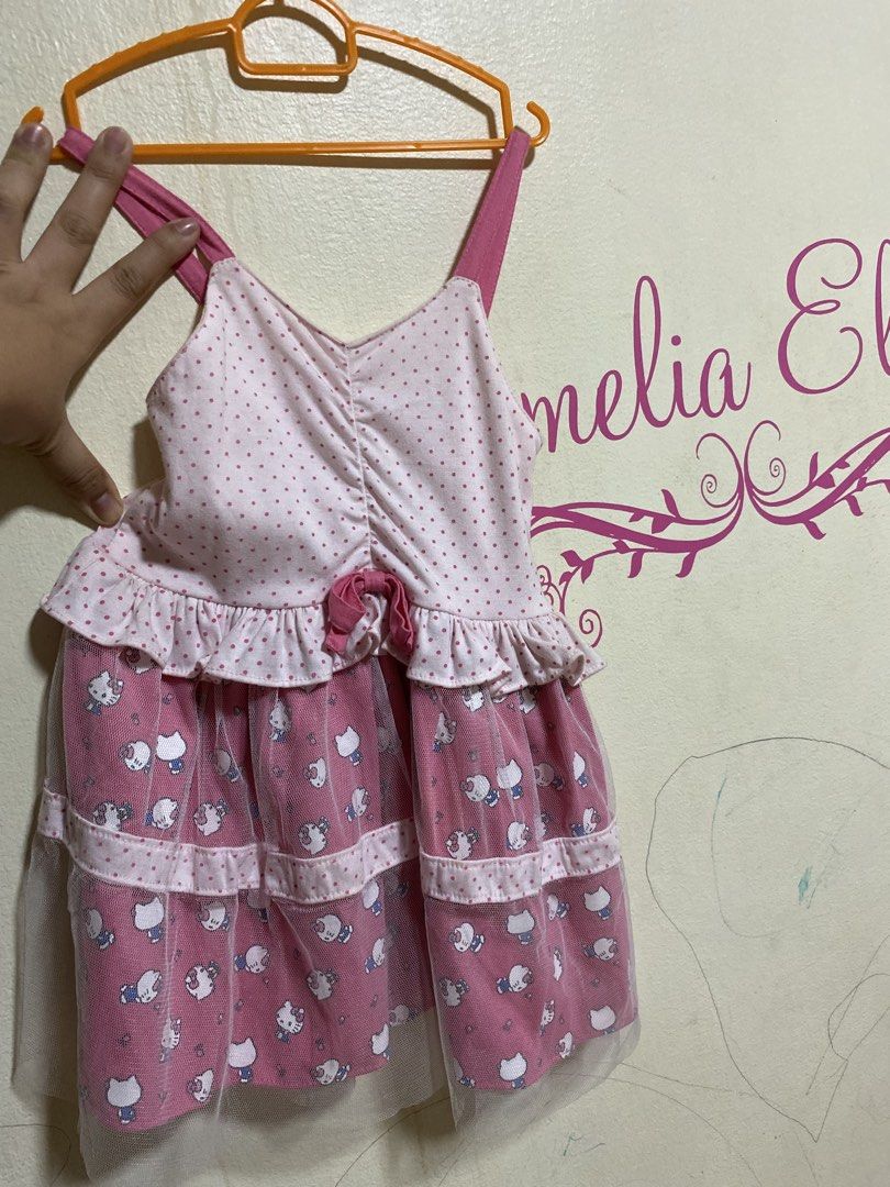 Hello Kitty Pink Polka Dot Ruffle Dress (Category: Dresses) located in Manila. Submitted by chingsenallertse (Listing ID 1460245836, Image 1). Description: - Cute pink Kitty dress - Polka dot top with ruffles - Multi-layered skirt with Kitty prints - Sheer trim on skirt - Adjustable straps - Ideal for Kitty fans.