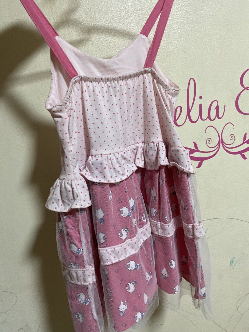 Hello Kitty Pink Polka Dot Ruffle Dress (Category: Dresses) located in Manila. Submitted by chingsenallertse (Listing ID 1460245836, Image 2). Description: - Cute pink Kitty dress - Polka dot top with ruffles - Multi-layered skirt with Kitty prints - Sheer trim on skirt - Adjustable straps - Ideal for Kitty fans.